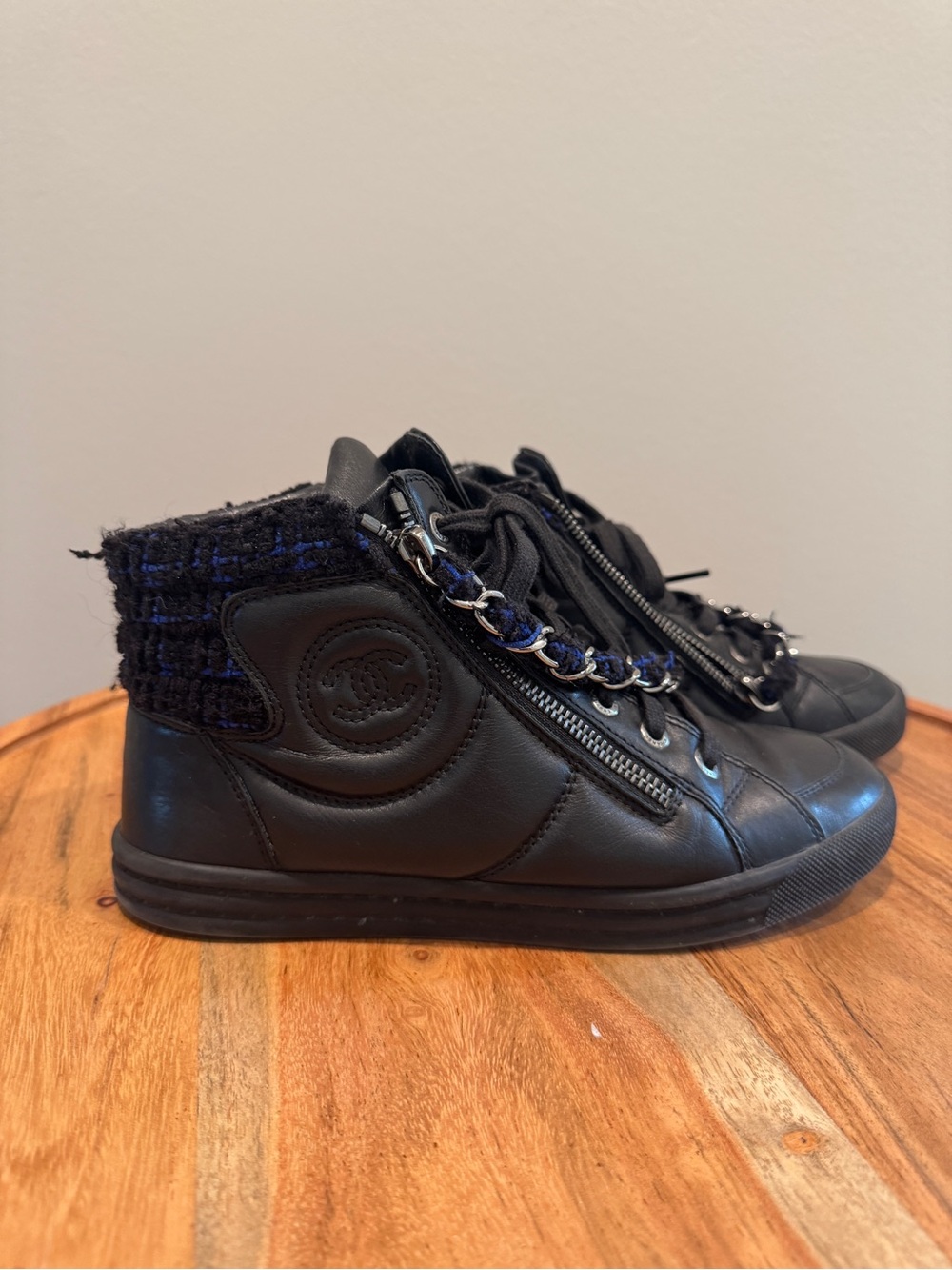 CHANEL leather and tweed High-Top Sneakers with Chain Trim